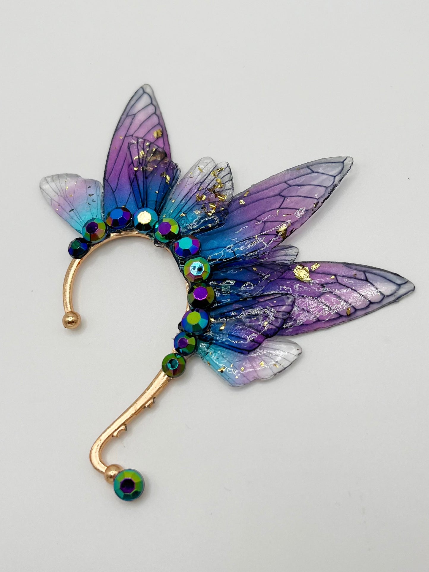 Purple and blue fairy wing ear cuff with blue rhinestones.