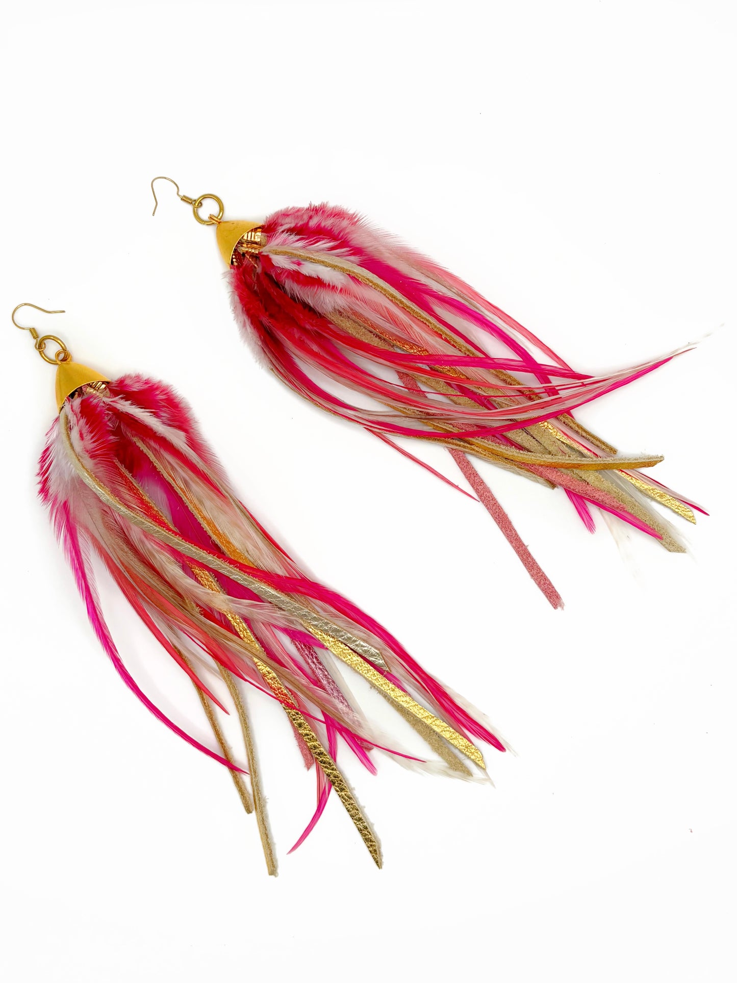 Pink and gold feather and leather earrings.
