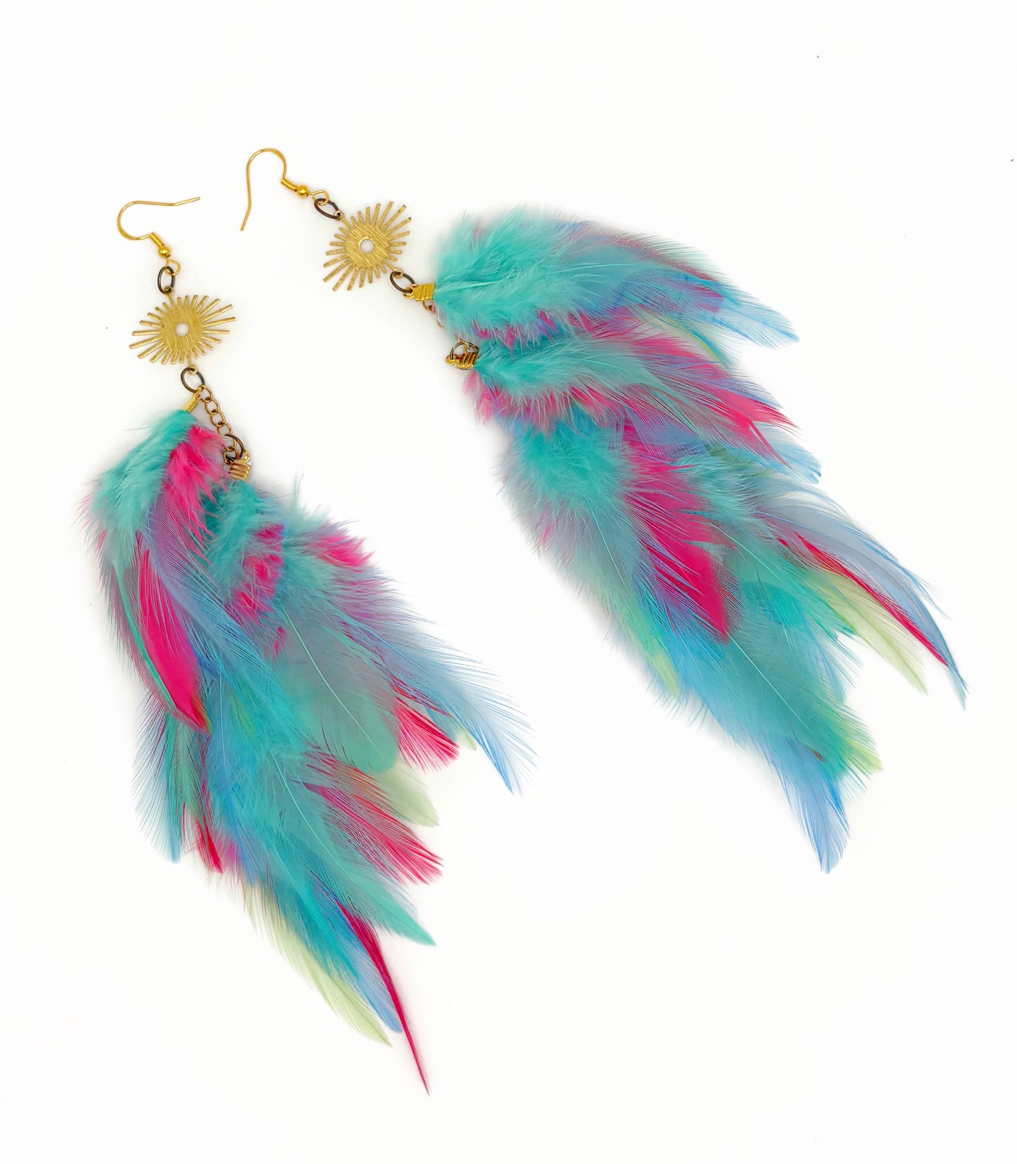 Colorful feather earrings on a white background