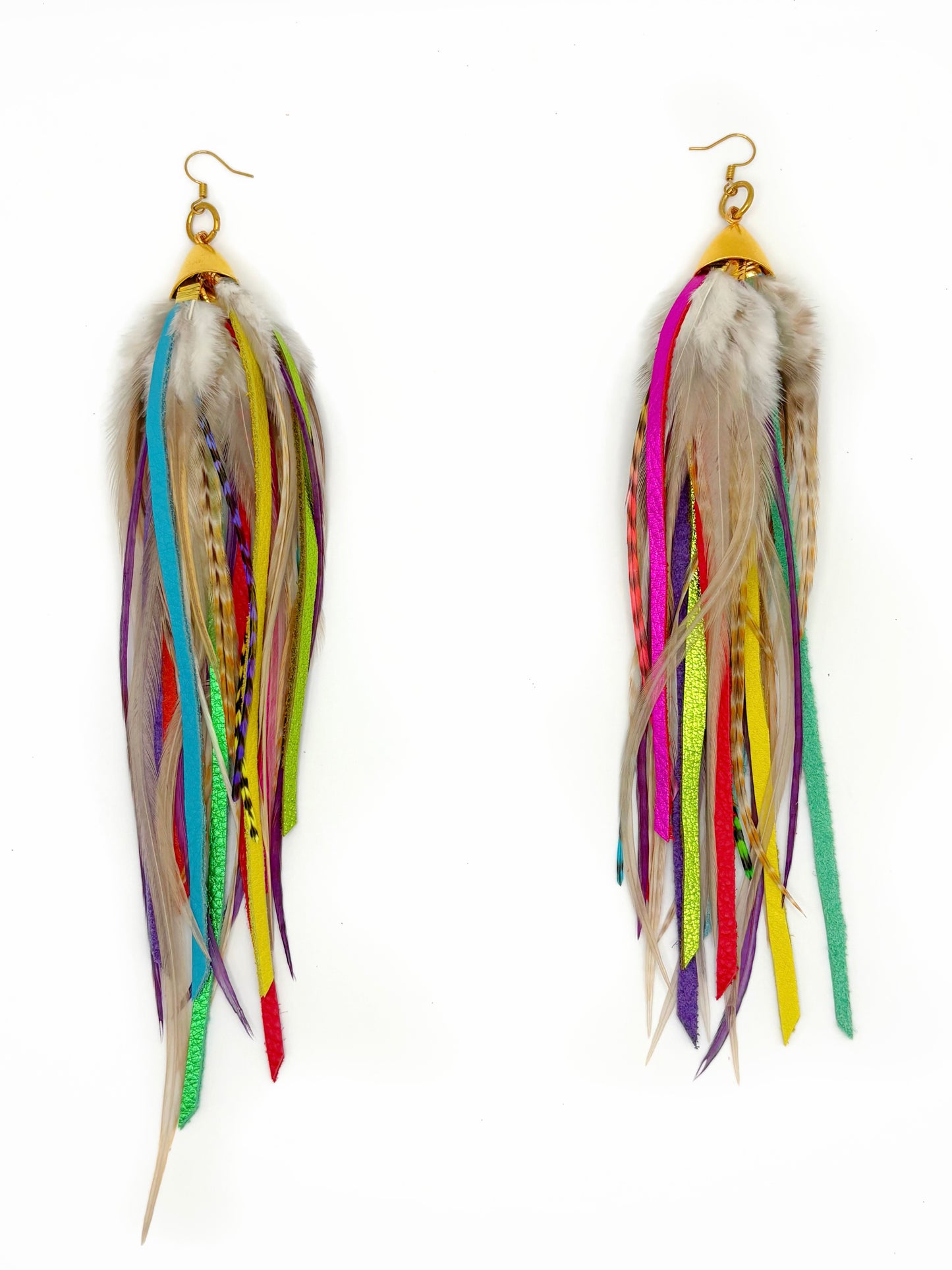 Colorful feather earrings on a white background