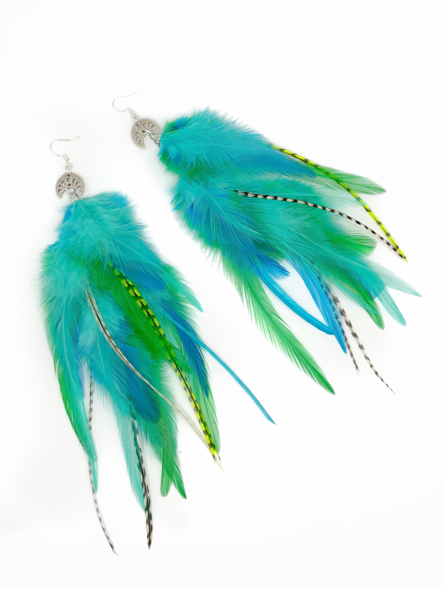 Long green feather earrings.