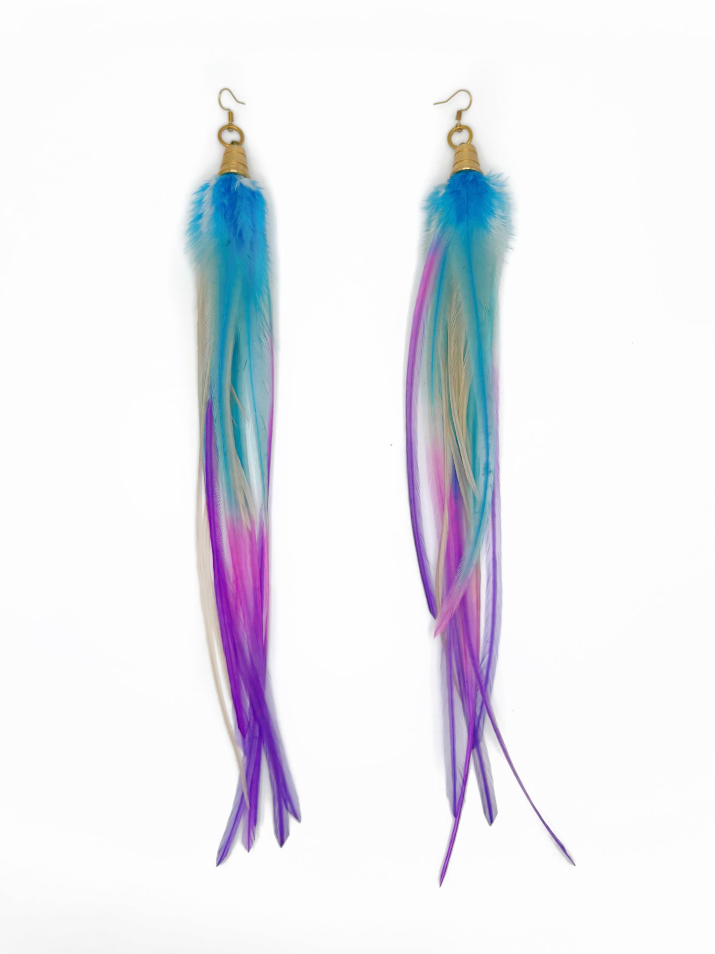 Long feather earrings in white, purple and blue.