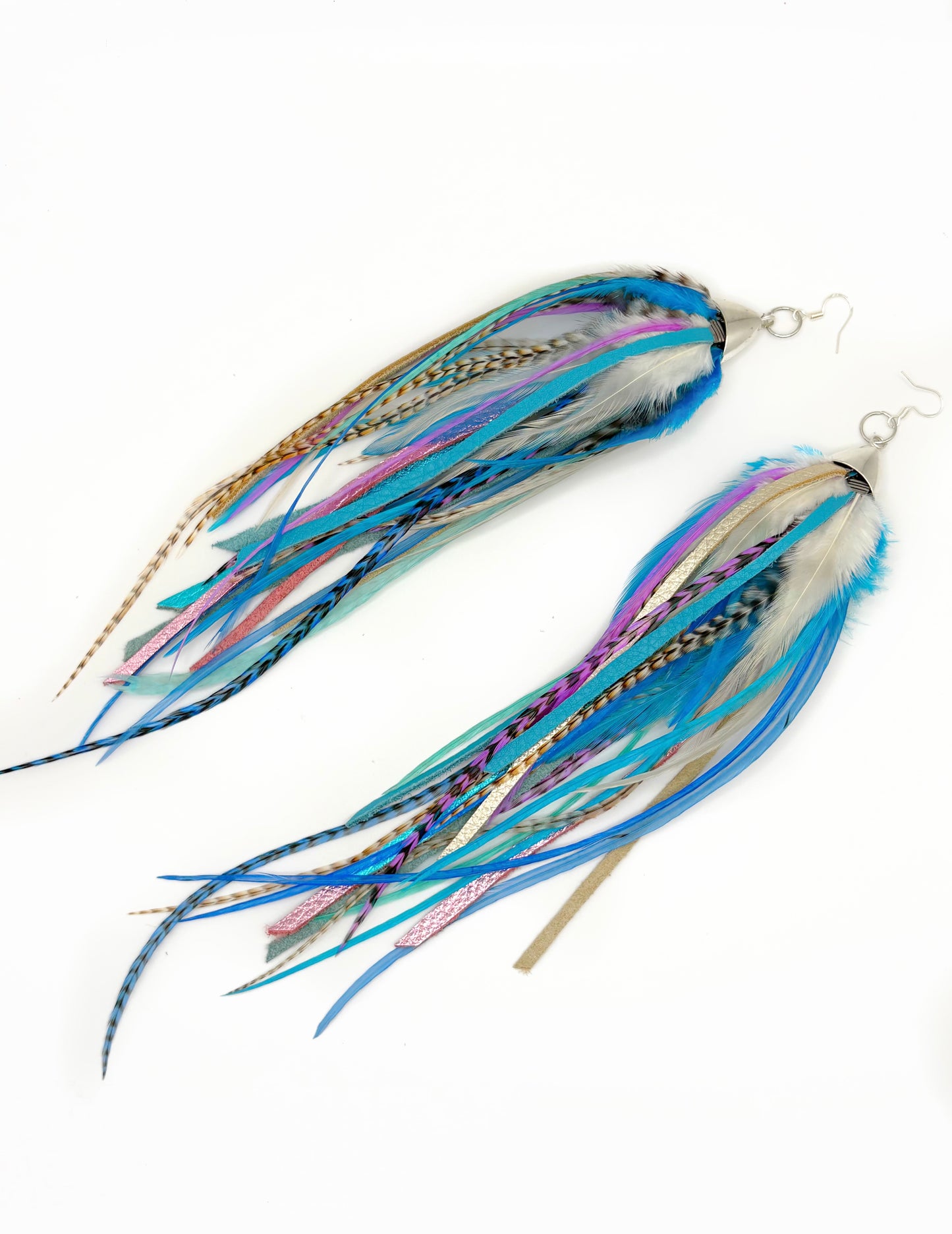 Two fishing lures with blue and purple accents on a white background