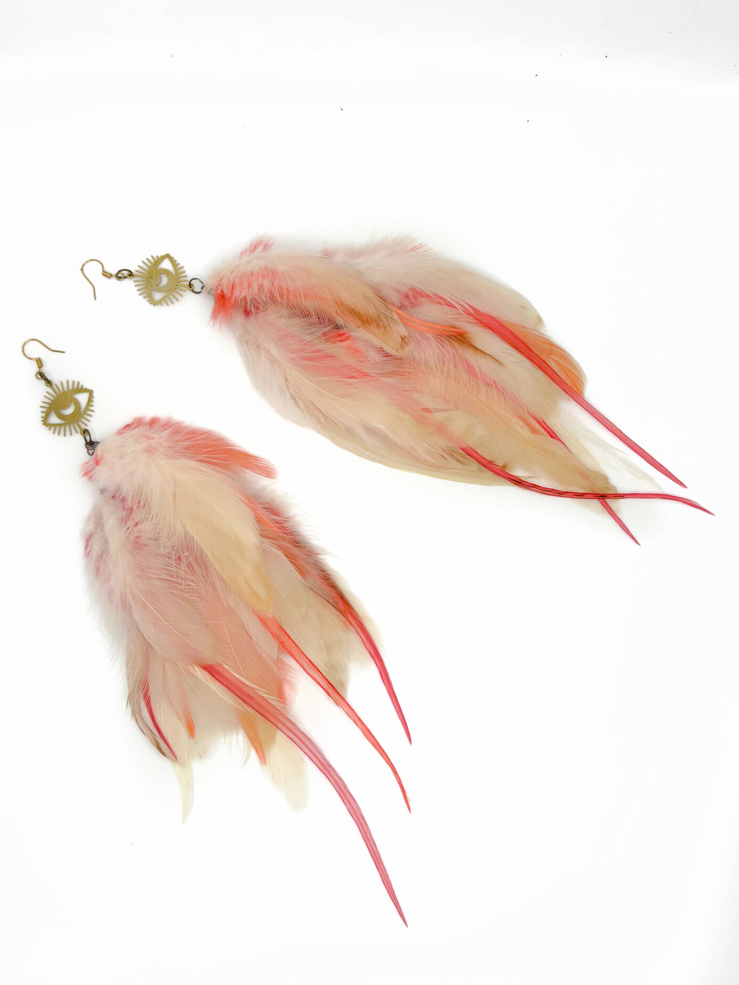 Long cream and pink feather earrings.