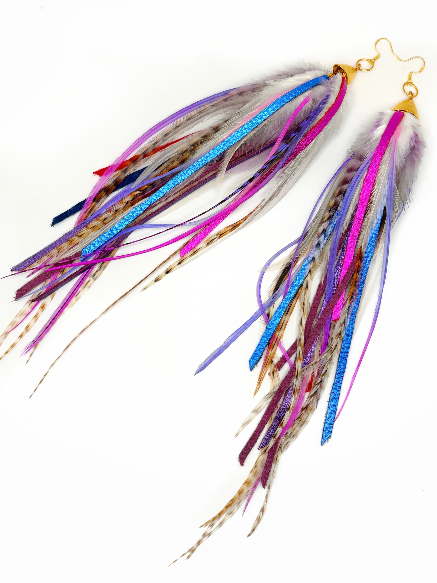 Colorful fishing lure with multicolored fibers on a white background