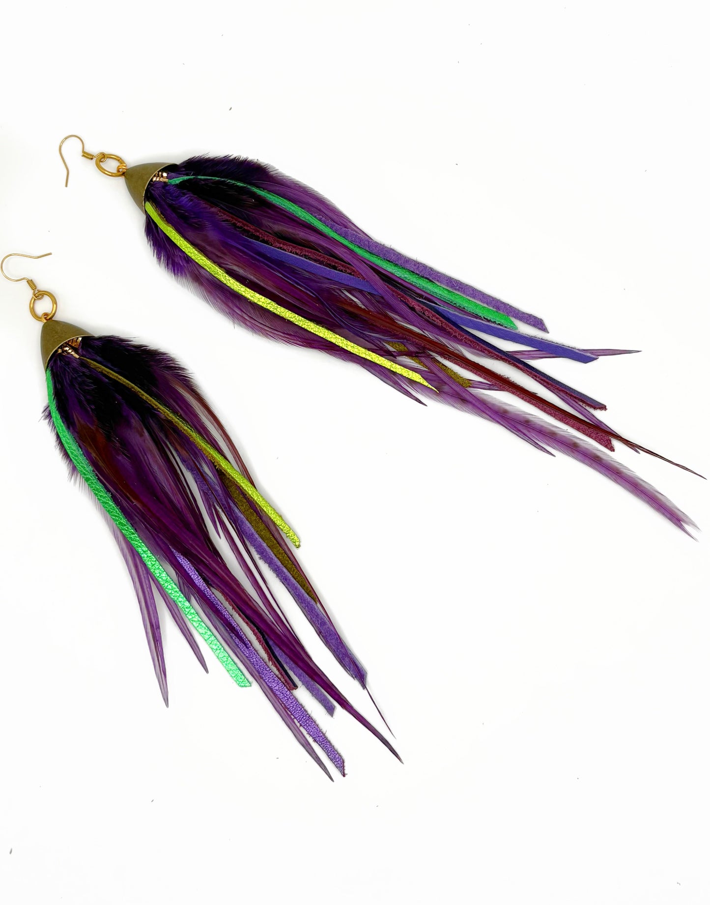 Long purple feather earrings with green leather.