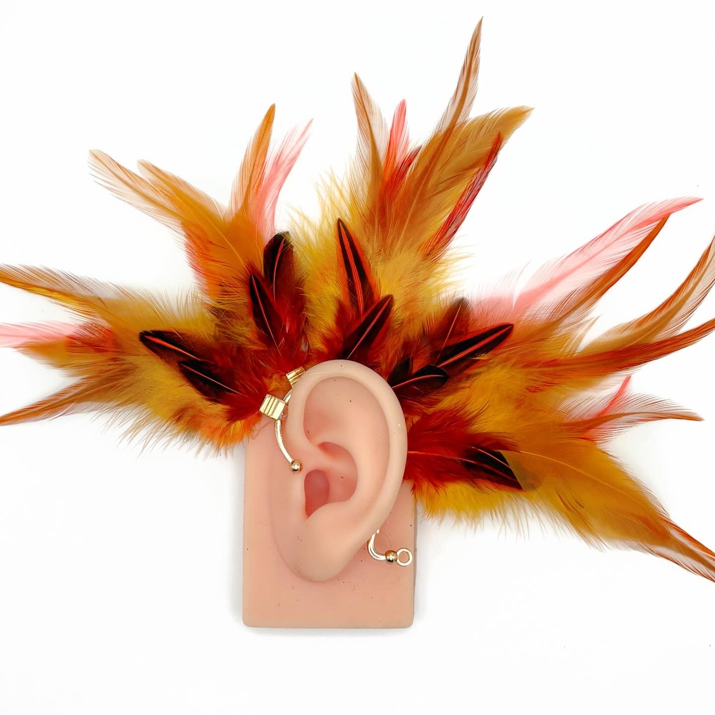 Yellow and orange feather ear cuff.
