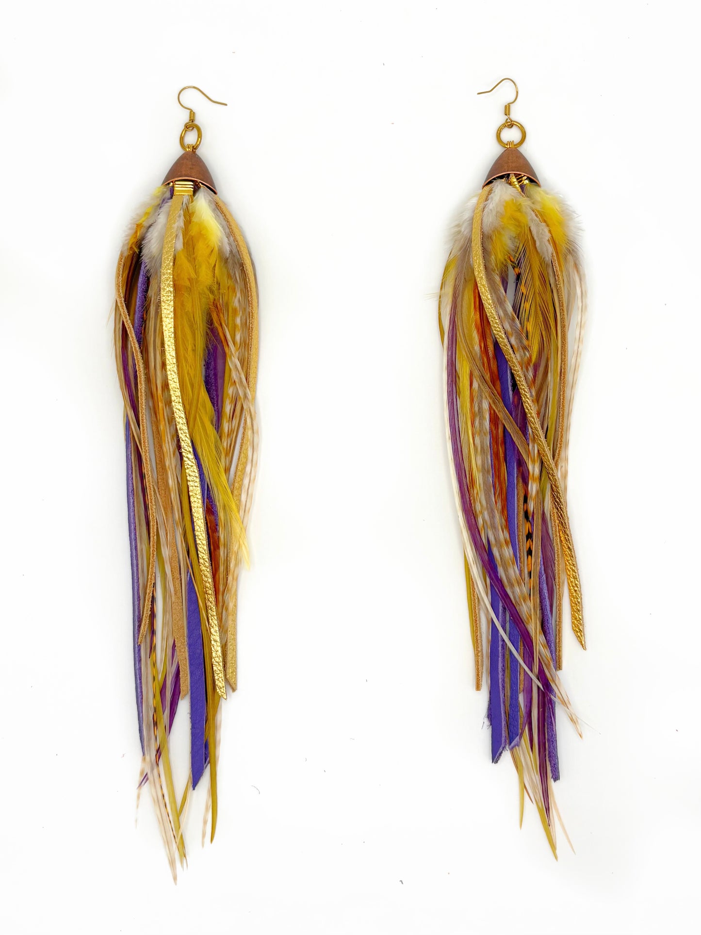 Feather earrings with gold, purple, and beige feathers on a white background