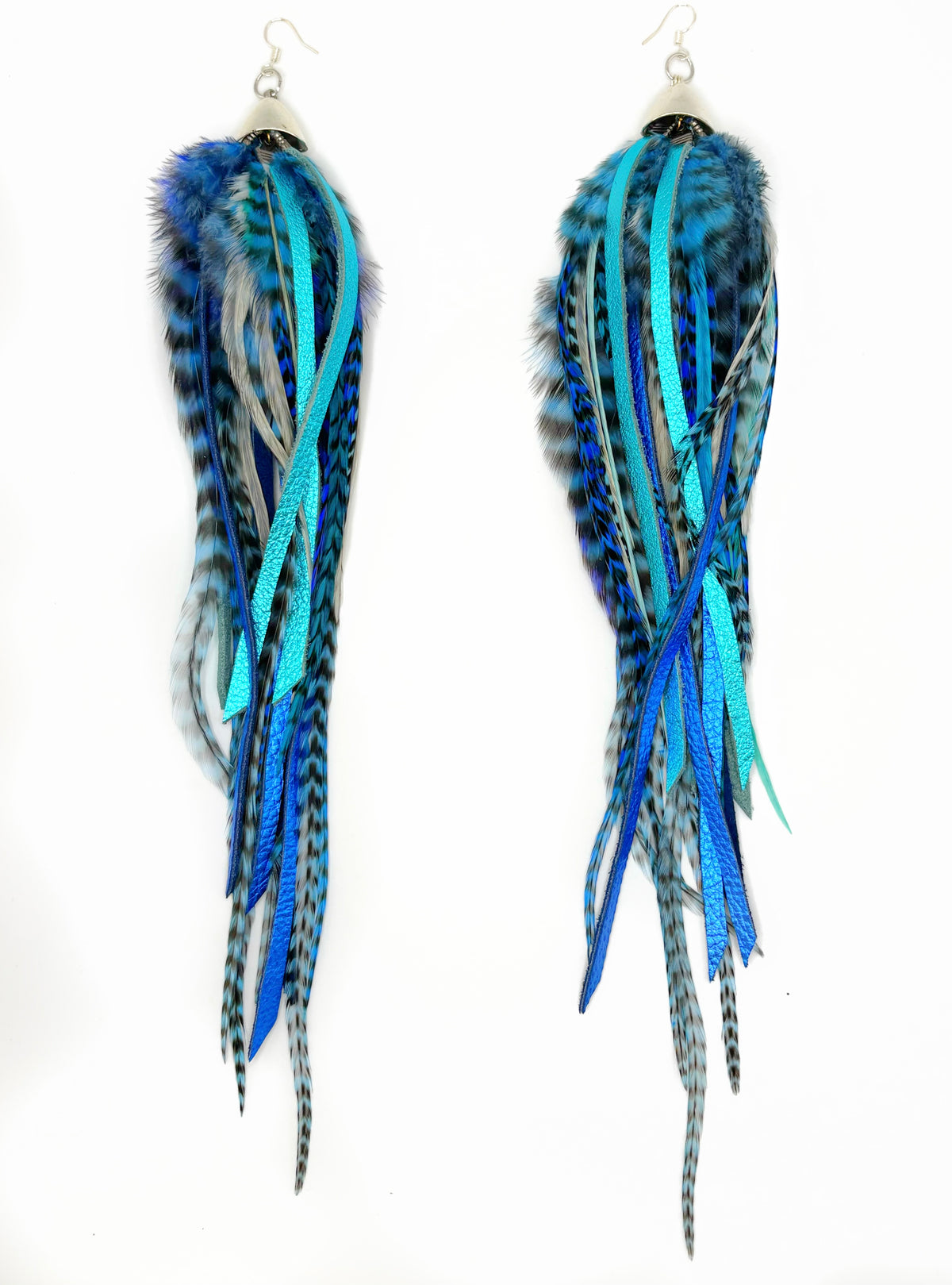 Extra-long bohemian feather and leather earrings with navy blue, turquoise and white rooster feathers, metallic leather accents and silver caps, handmade in Brooklyn.