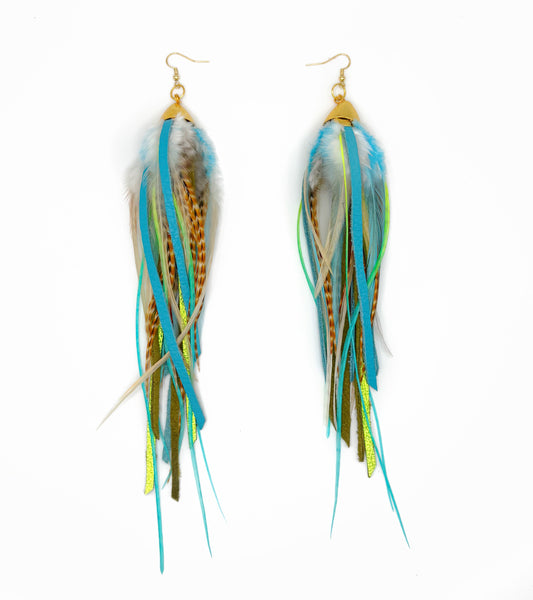 Feather earrings with blue, green, and brown strands on a white background