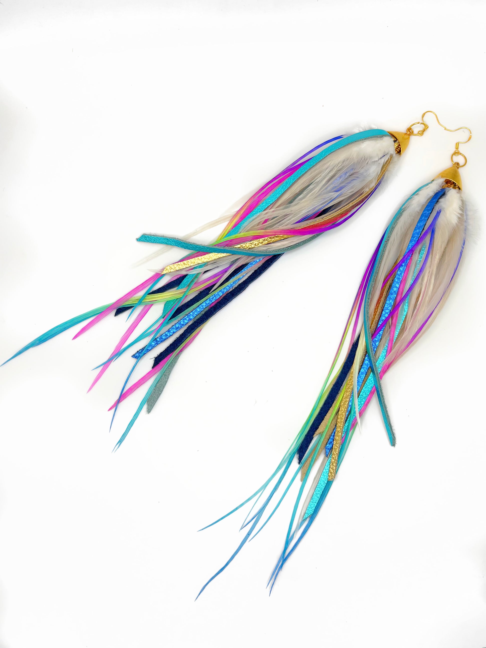 Colorful fishing lure with multiple strands on a white background
