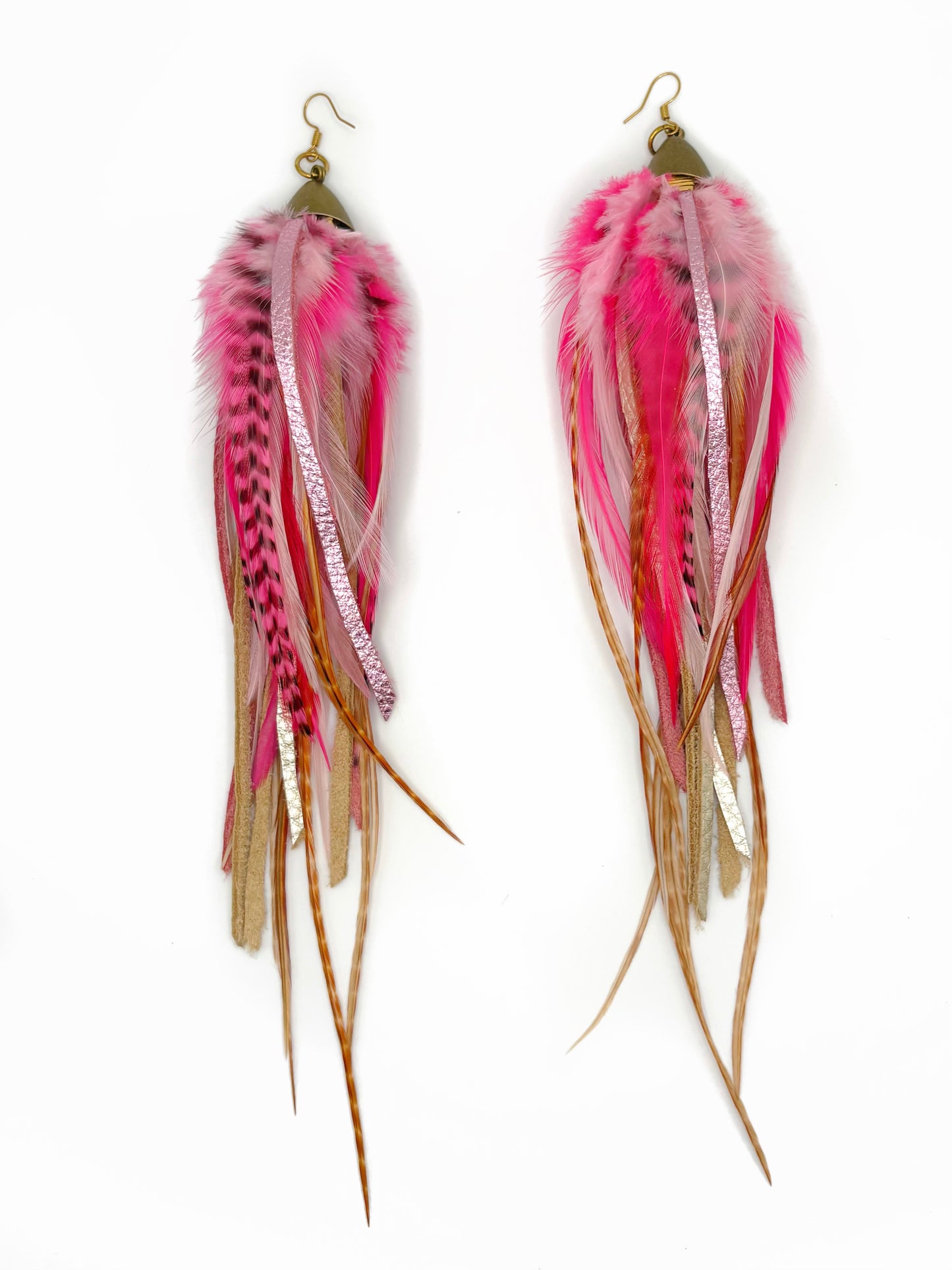 Feather earrings with pink and brown feathers on a white background