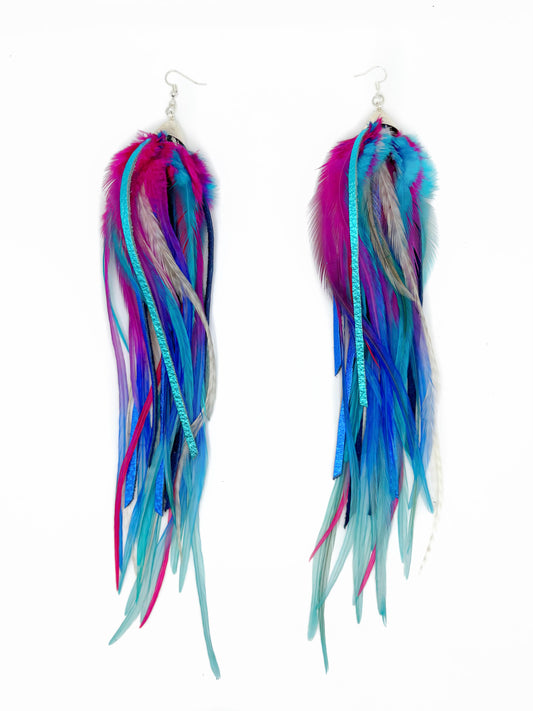 Long pink and blue feather and leather earrings. 