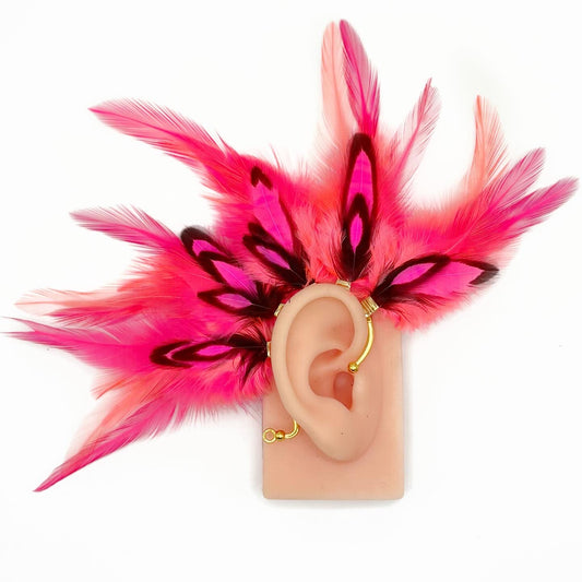 Neon pink feather ear cuff. 