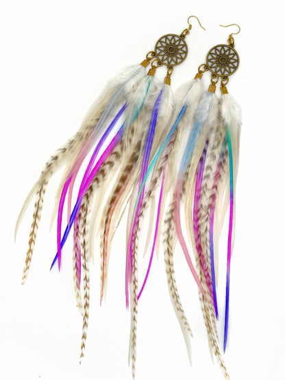 Extra long dream catcher feather earrings in white and pastel pink, purple and blue tones. 