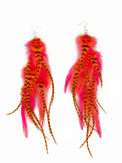 Neon pink and orange feather earrings. 