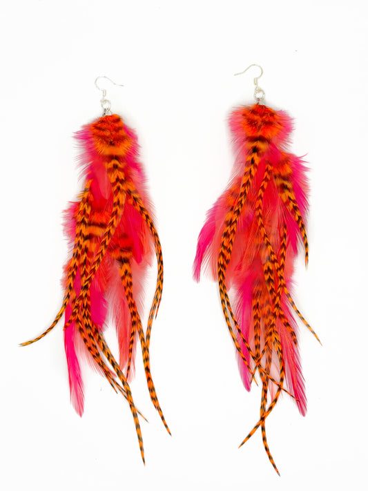 Neon pink and orange feather earrings. 