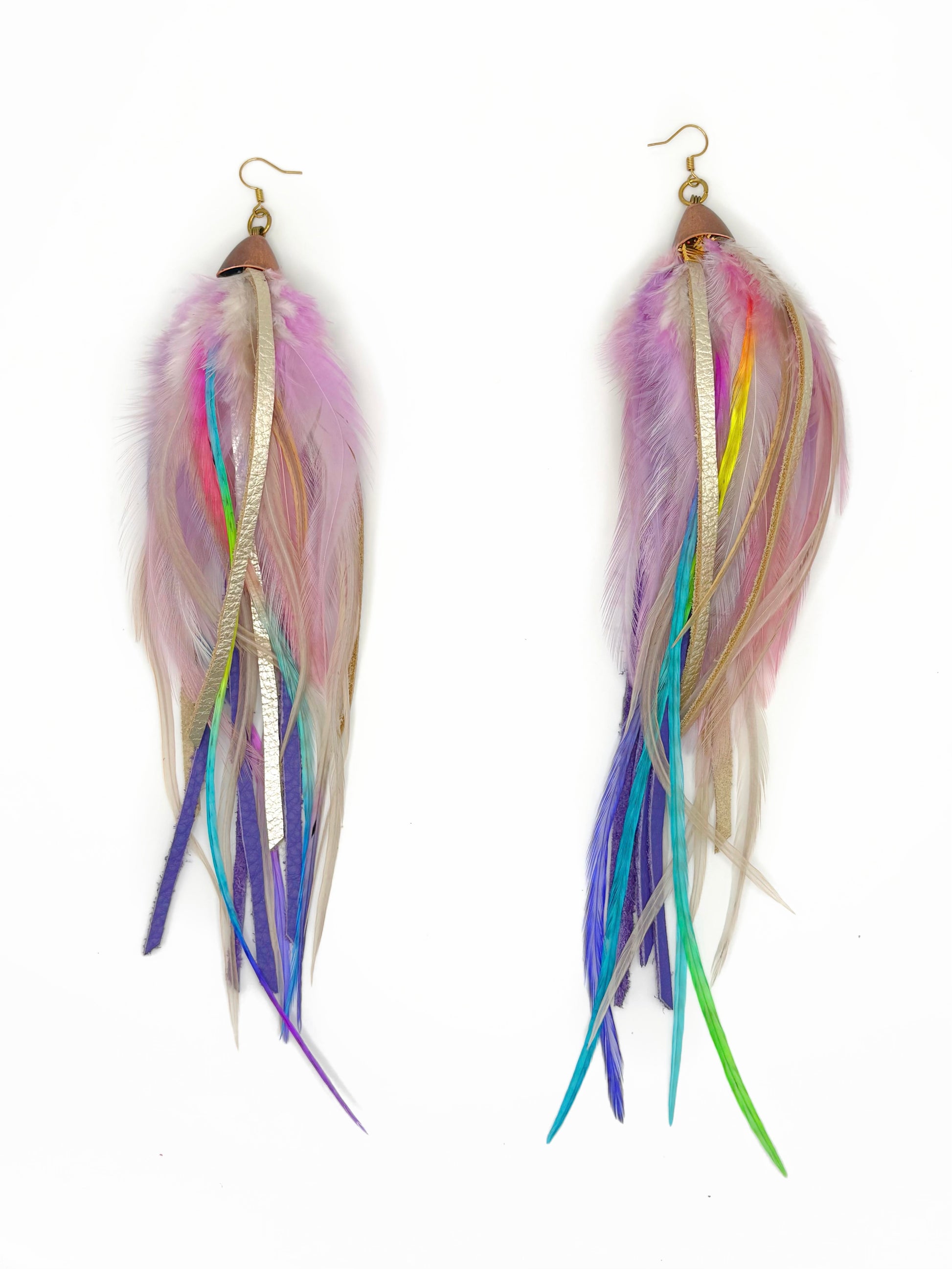 Multicolored feather earrings on a white background