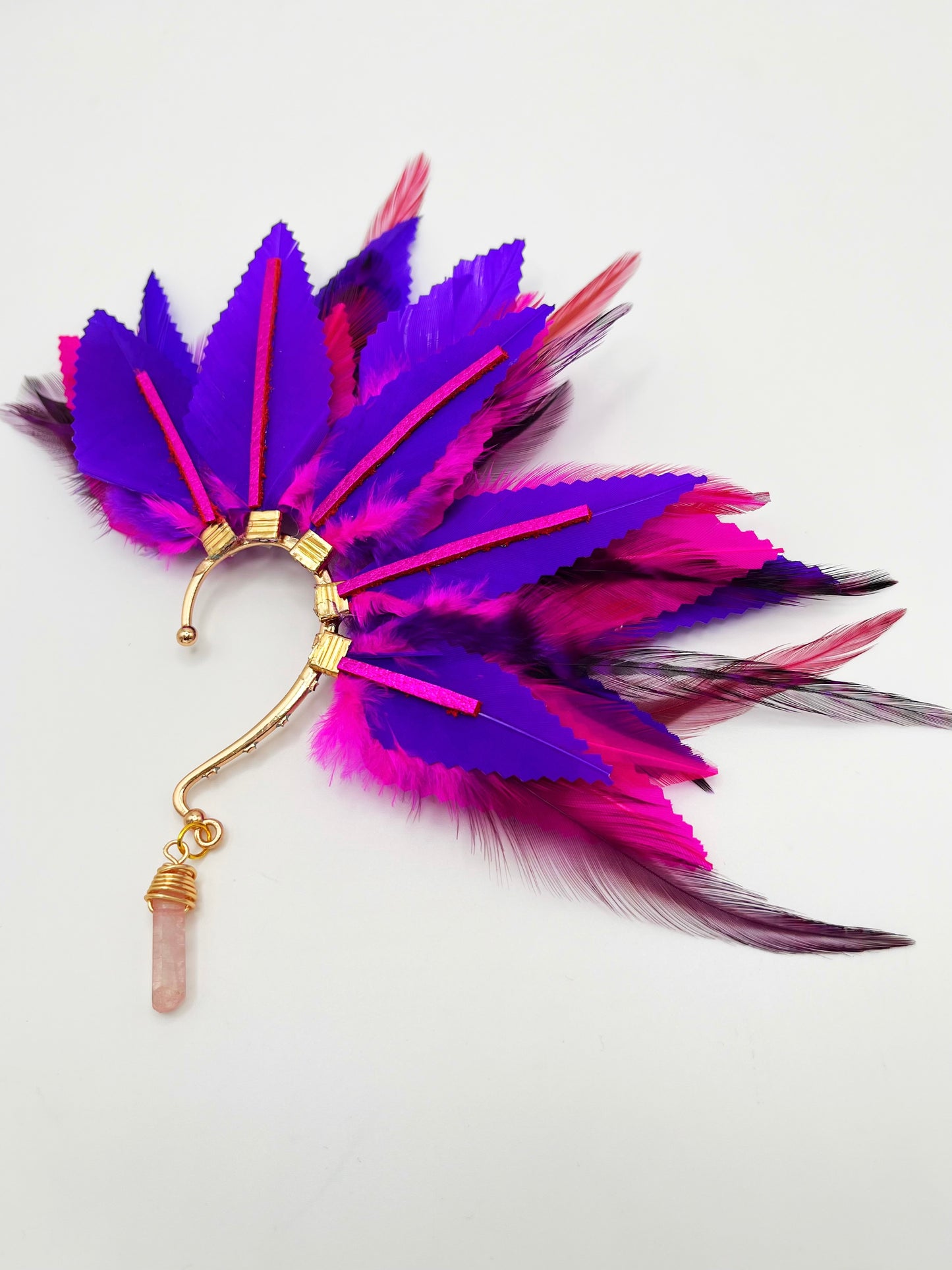 Structured purple and pink feather ear cuff with pink leather accents and a wire wrapped quartz.