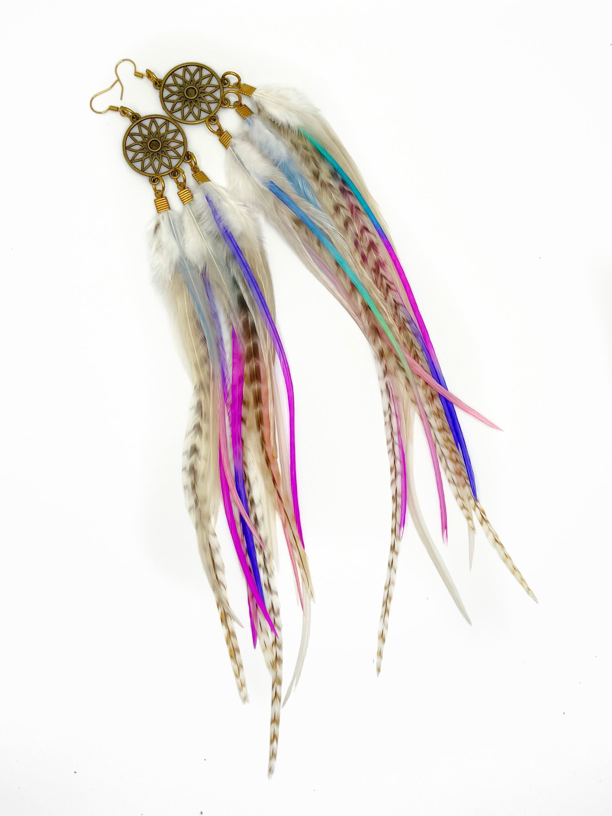 Extra long dream catcher feather earrings in white and pastel pink, purple and blue tones. 