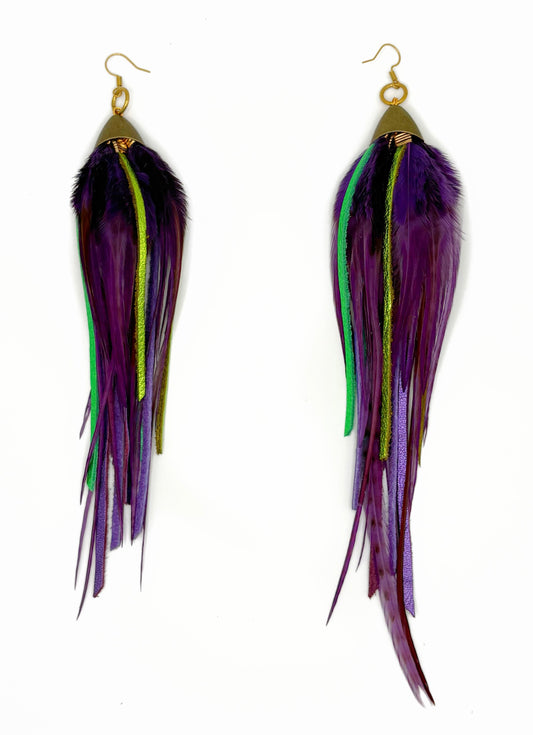 Long purple feather earrings with green leather.