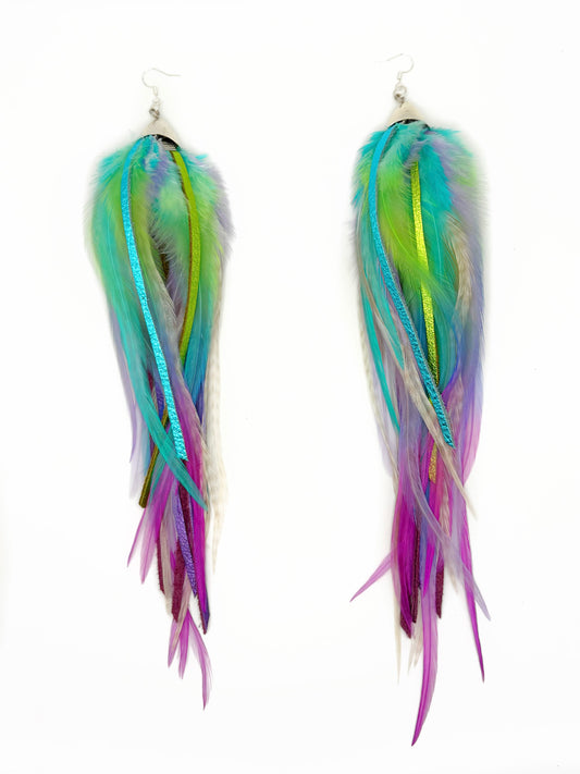 Long feather and leather earrings in blue, green and purple. 