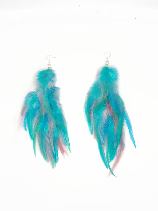 Long fluffy feather earrings in light blue. 