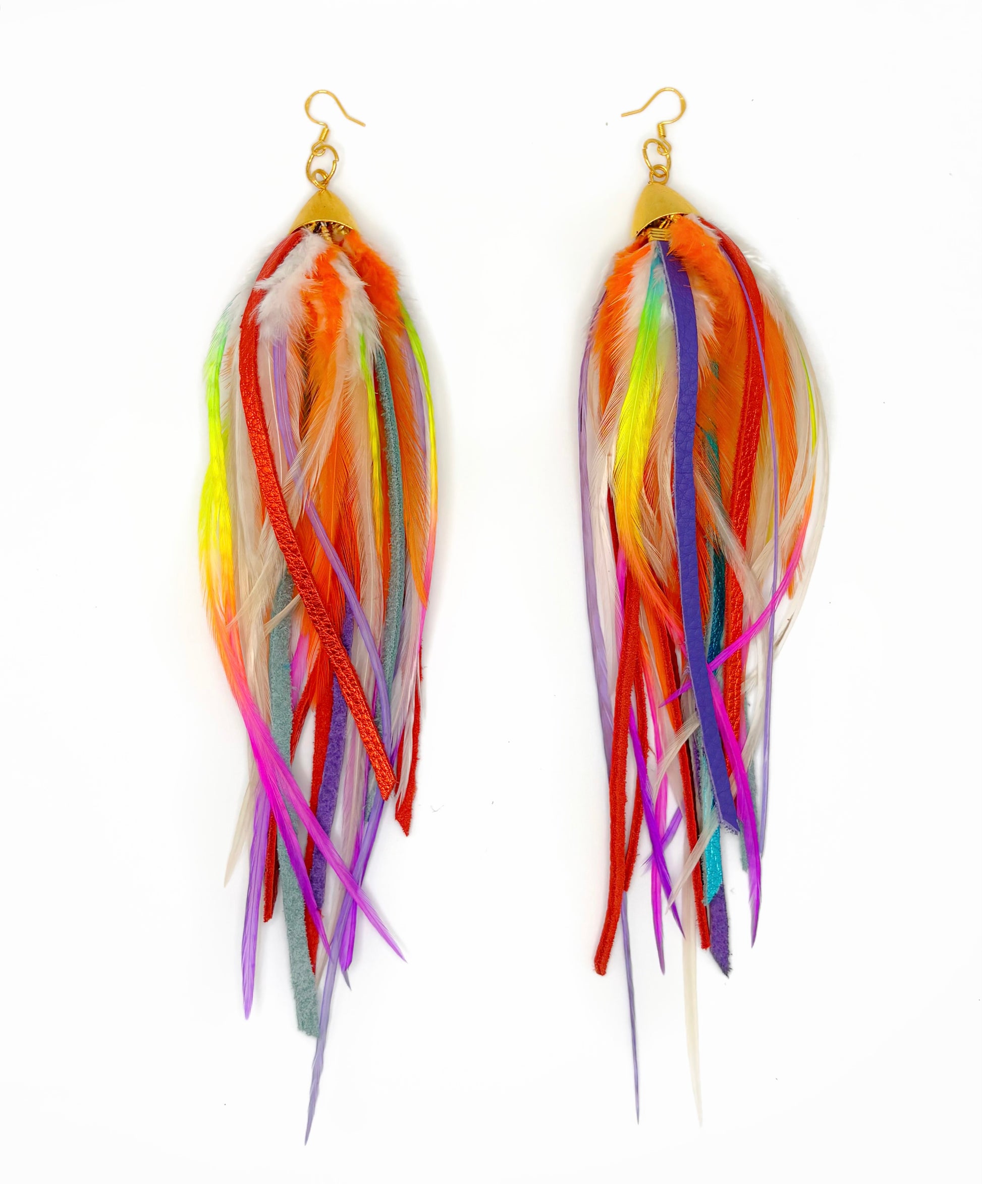 Colorful feather earrings on a white background