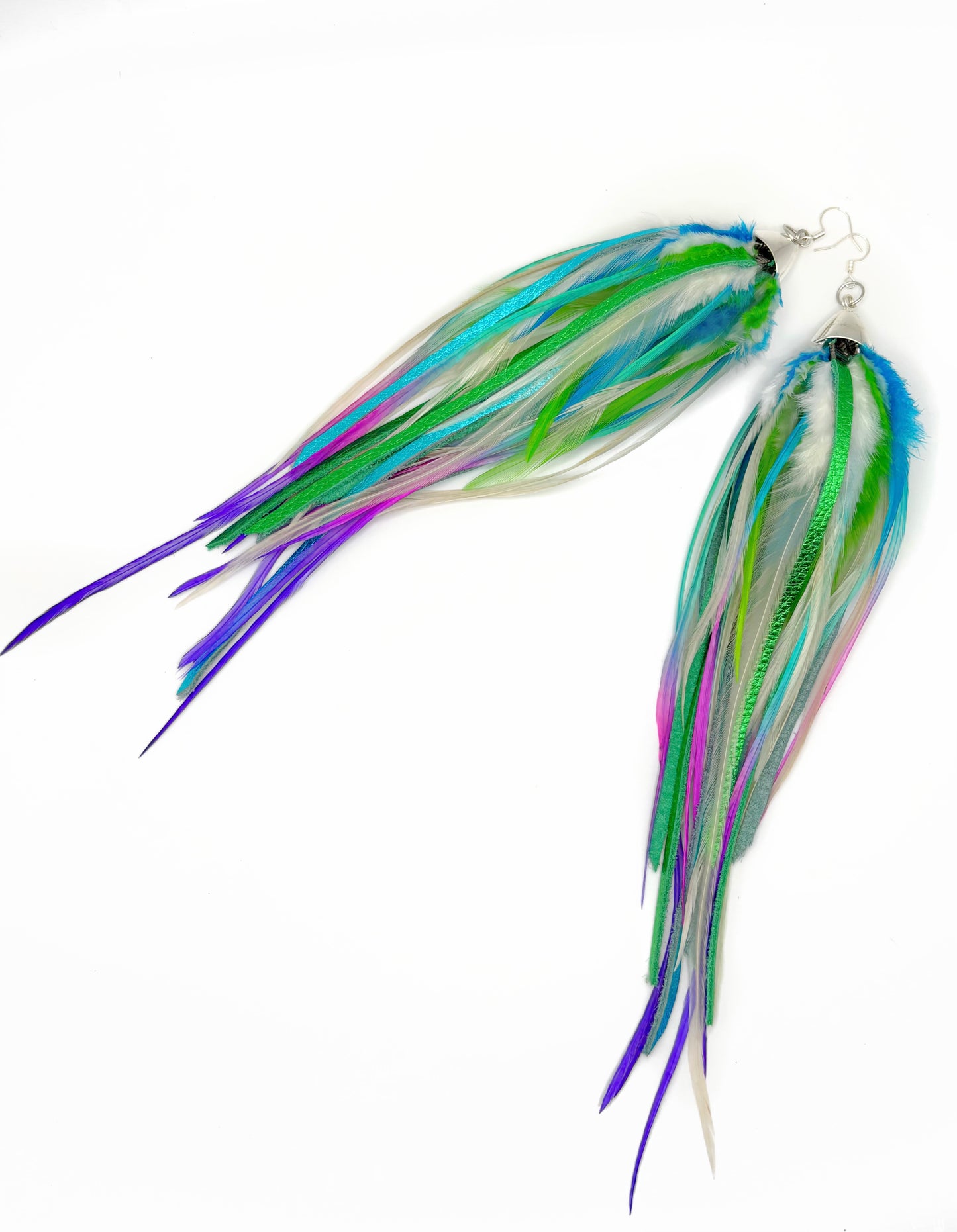 Colorful fishing lure with long streamers on a white background