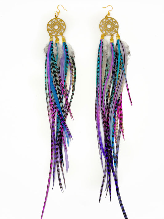 Feather earrings with gold dreamcatcher design on a white background