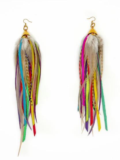 Colorful feather earrings on a white background