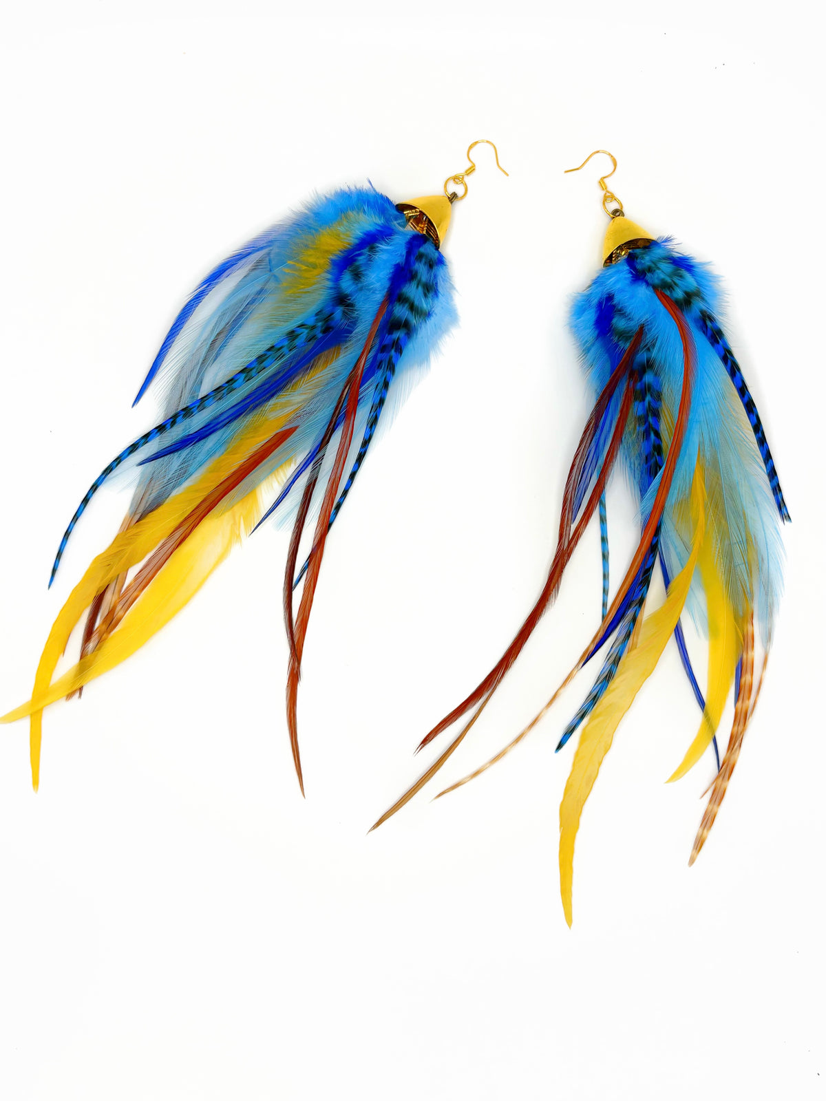 Long bohemian feather earrings with navy blue, light blue, golden yellow, brown and beige rooster feathers cascading from gold cap pendants, handmade in Brooklyn.