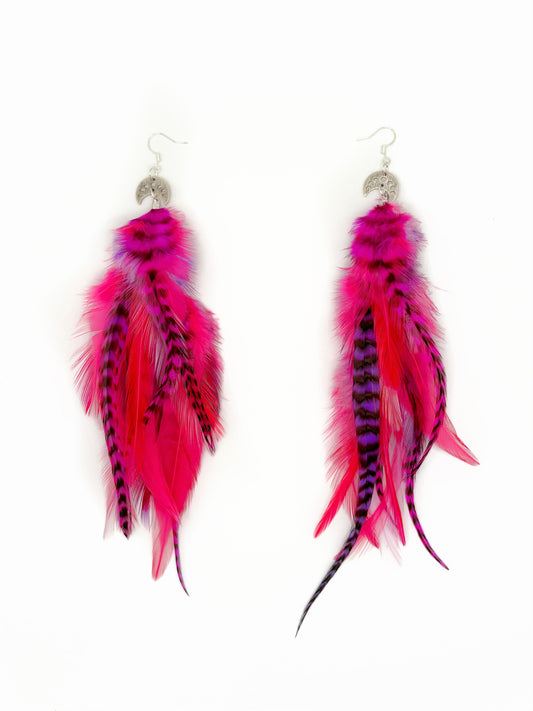 Bright pink and purple feather earrings. 