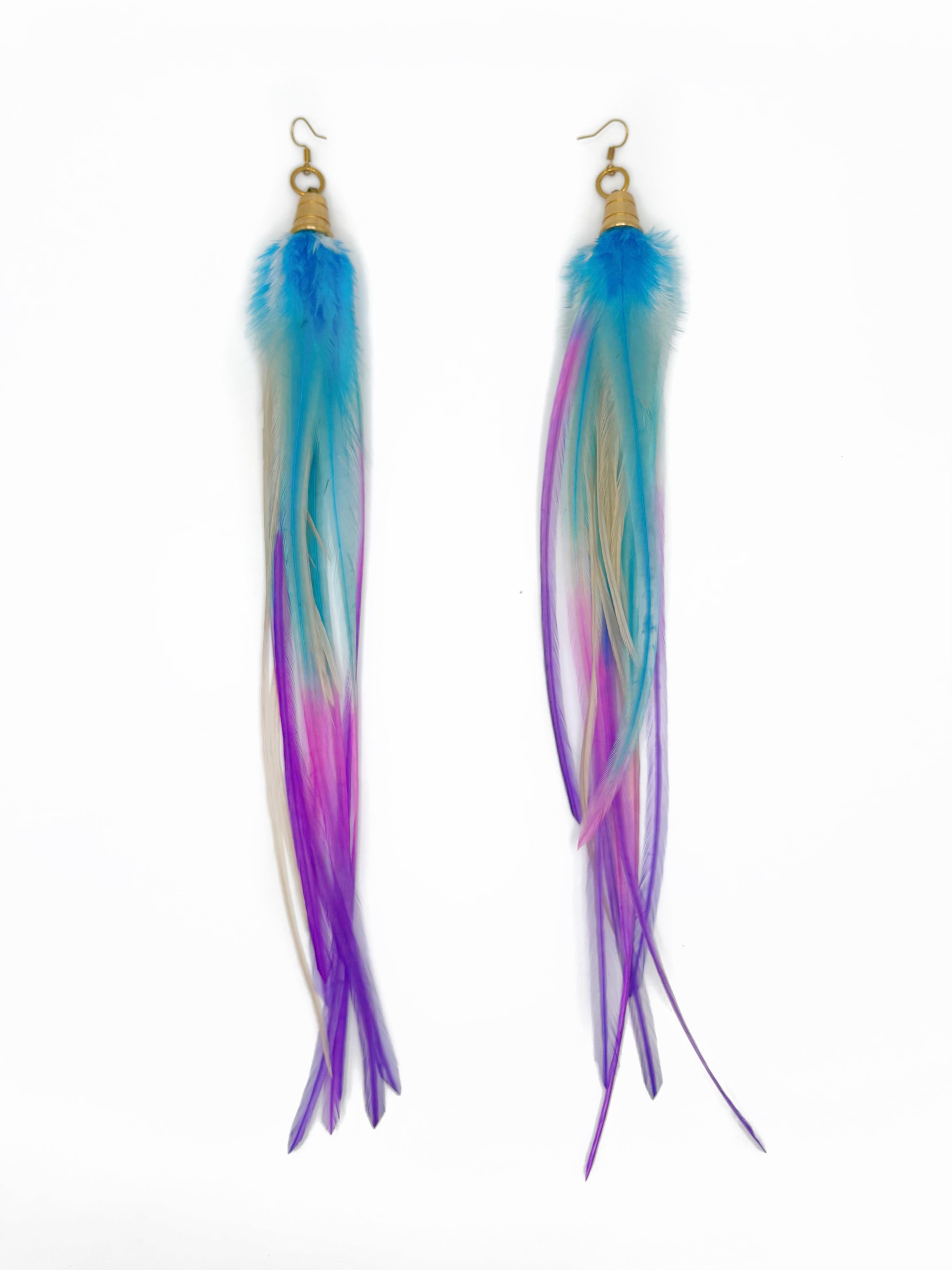 Long feather earrings in white, purple and blue.