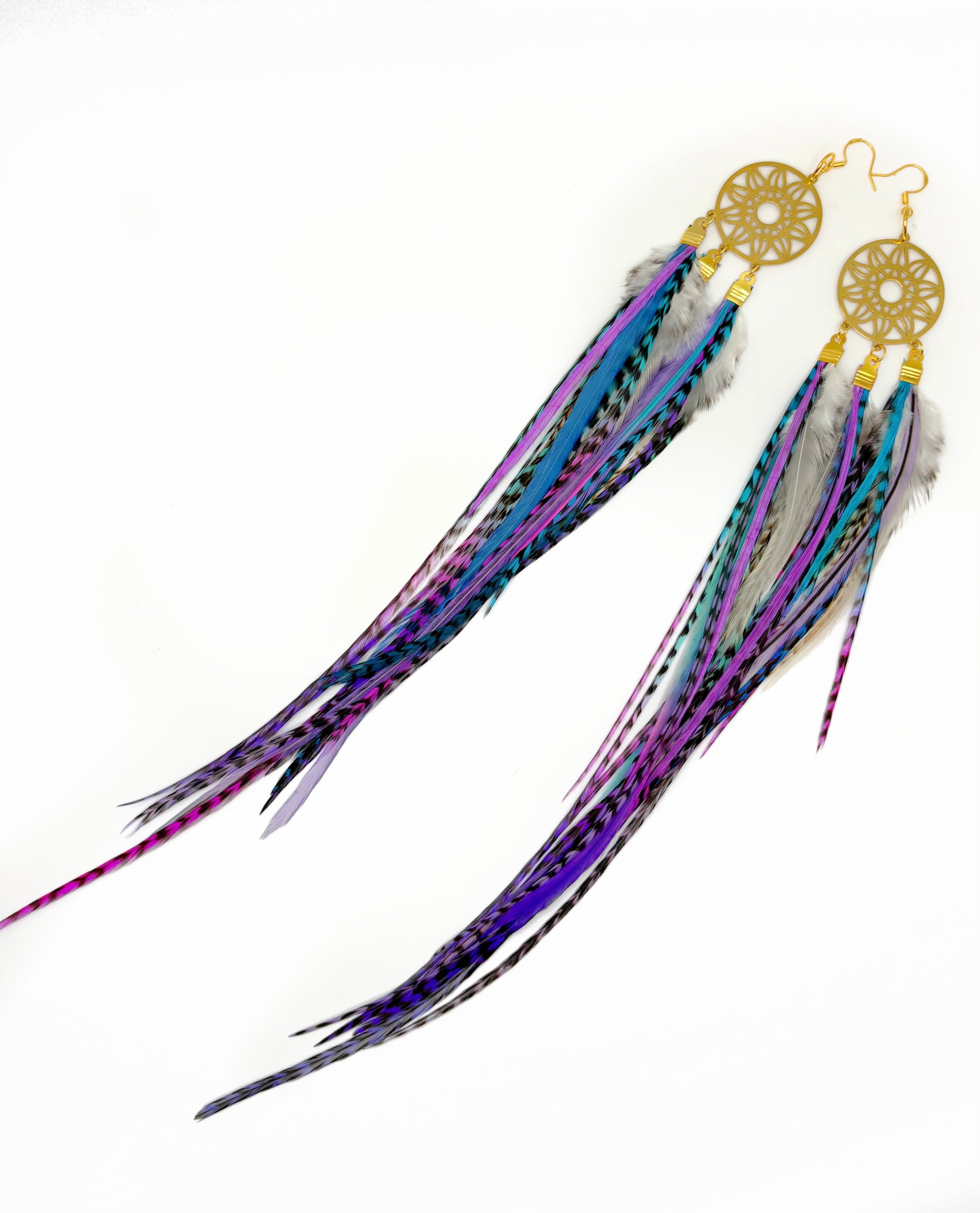 Feather earrings with gold dreamcatcher design on a white background