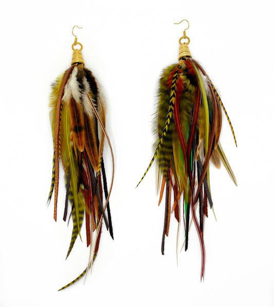 Long thick feather and leather earrings in rich brown and green tones. 