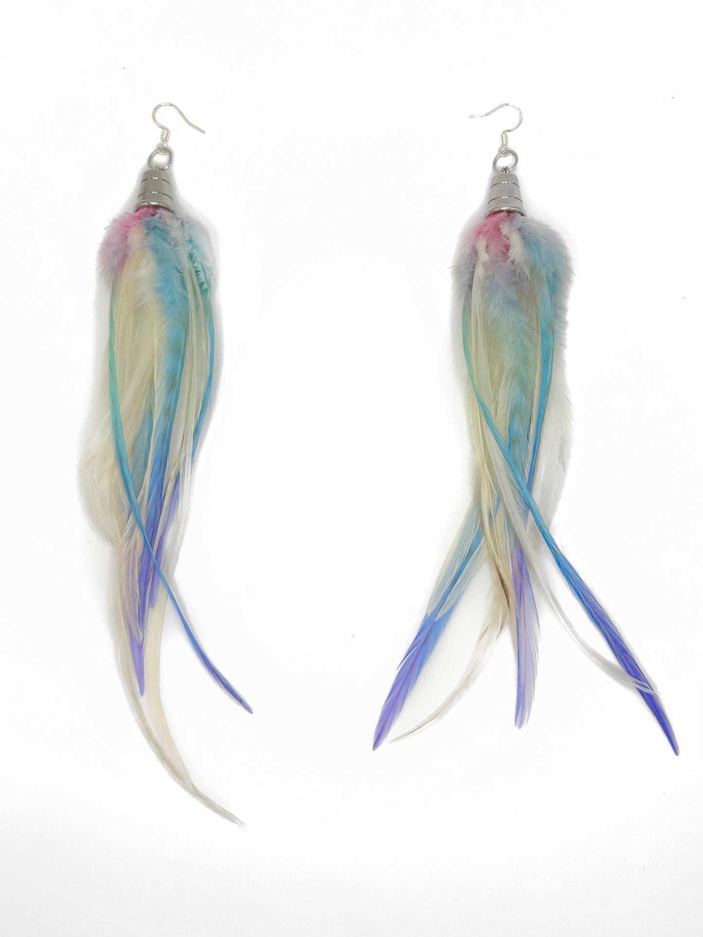 Feather earrings with multicolor strands on a white background