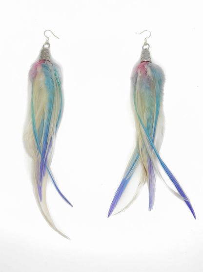 Feather earrings with multicolor strands on a white background
