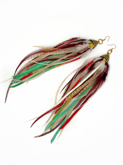 Feathered earrings with multicolored feathers on a white background