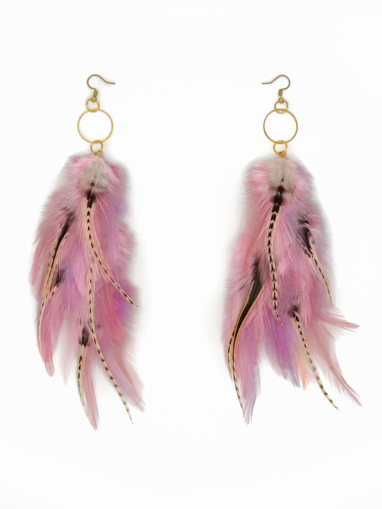 Pair of feather earrings with pink and gold accents on a white background