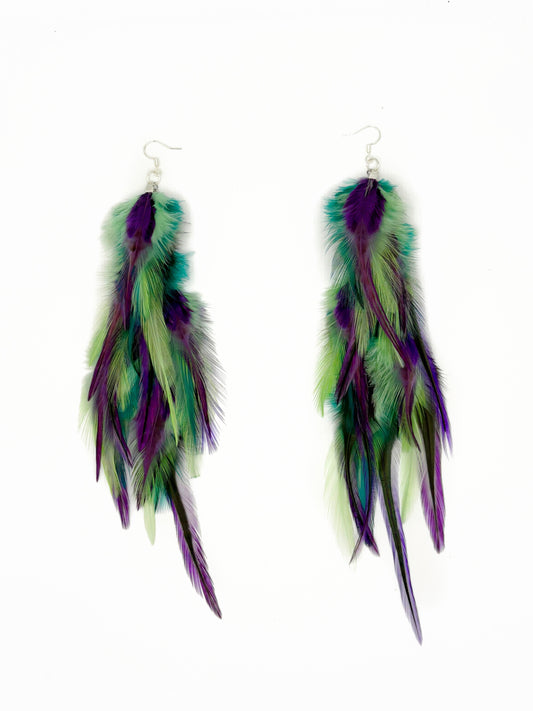 Long green and purple feather earrings. 