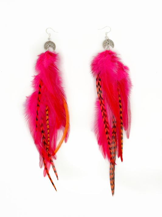 Neon pink feather earrings. 